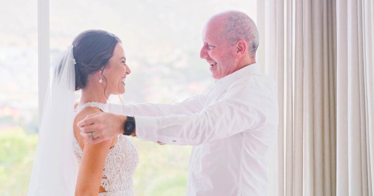 Elderly man tearfully smiling as he looks at bride granddaughter. (Representative Cover Image Source: Getty Images| Photo by Kobus Louw)