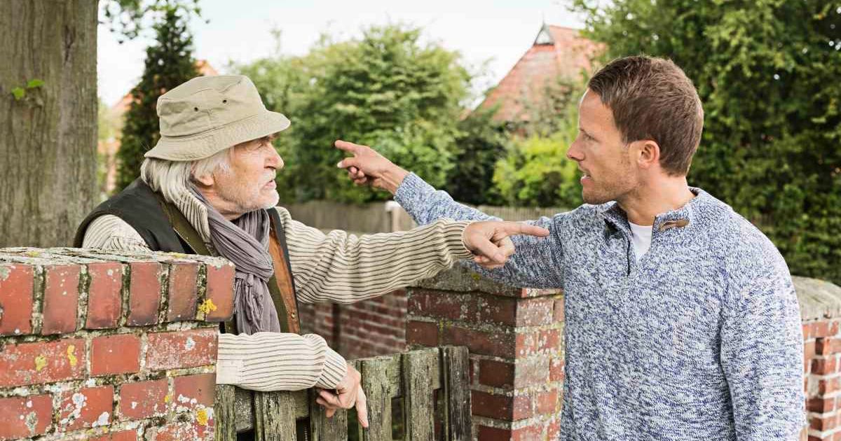 Old man confronting a man at his doorstep. Representative Cover Image Source: Getty Images | Nils Hendrik Mueller