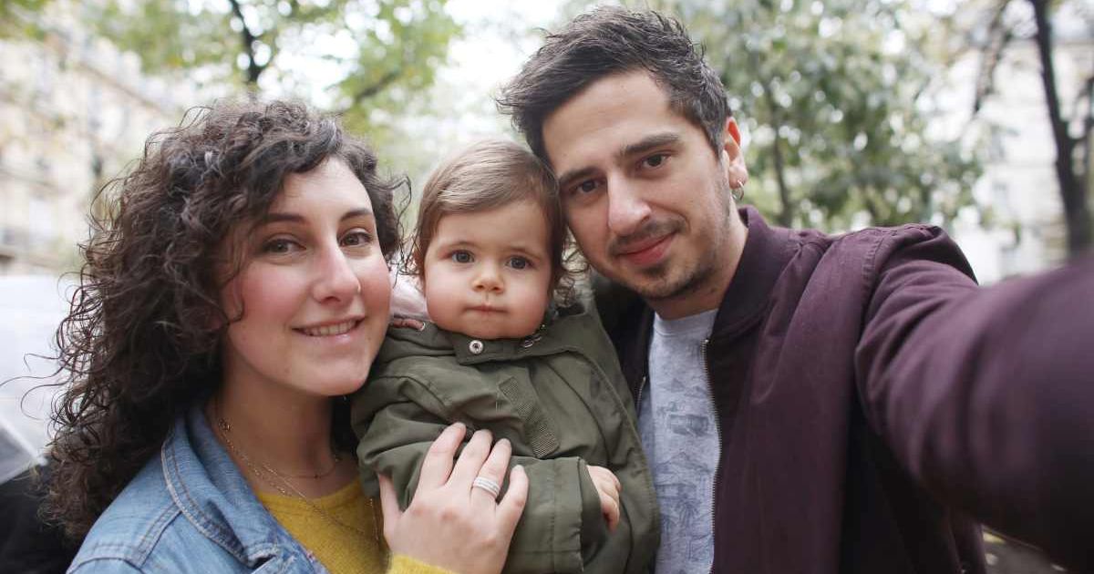 Mom and dad taking a selfie with their baby. Representative Cover Image Source: Getty Images | Catherine Delahaye