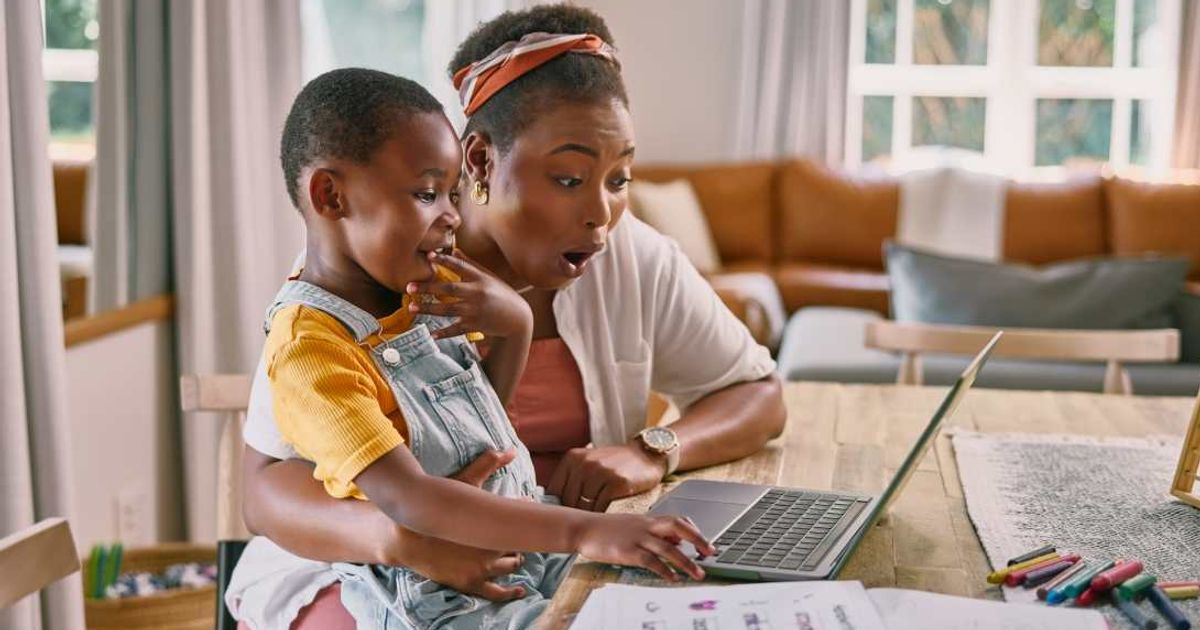 Mom surprised by something her son shows her. (Representative Cover Image Source: Getty Images | Photo by Marco VDM)