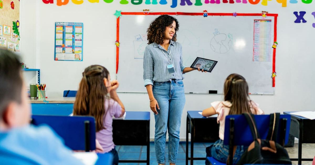 Teacher talking to her students during class. (Representative Cover Image Source: Getty Images | FG Trade Latin)