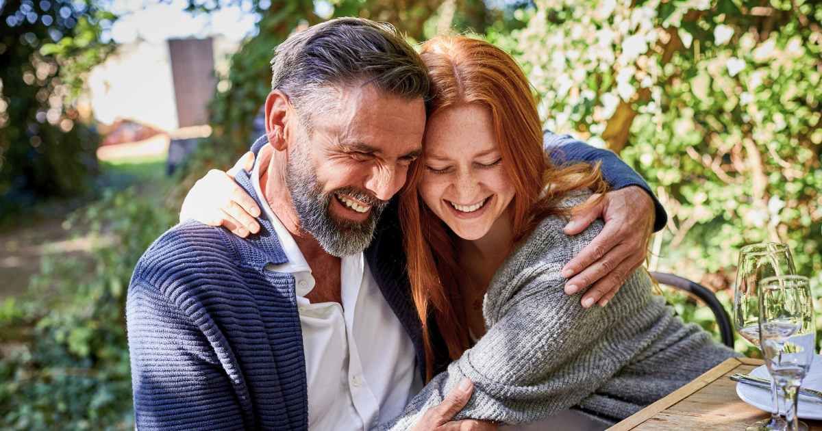 Dad embracing adult daughter affectionately. (Representative Cover Image Source: Getty Images| Photo by Oliver Rossi)