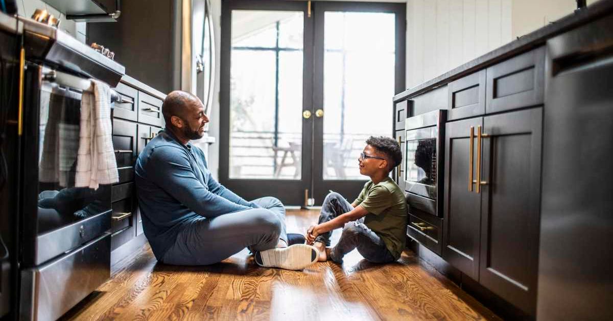 Son and dad talking to each other. Representative Cover Image Source: Getty Images | MoMo Productions