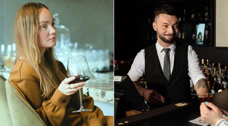 Woman getting harassed thought bartender handed her a receipt—but one hidden detail showed he had her back