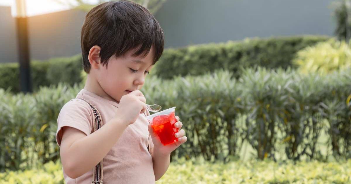 Boy eating Jell-O from a cup. Representative Cover Image Source: Getty Images | Love Portrait and love the world