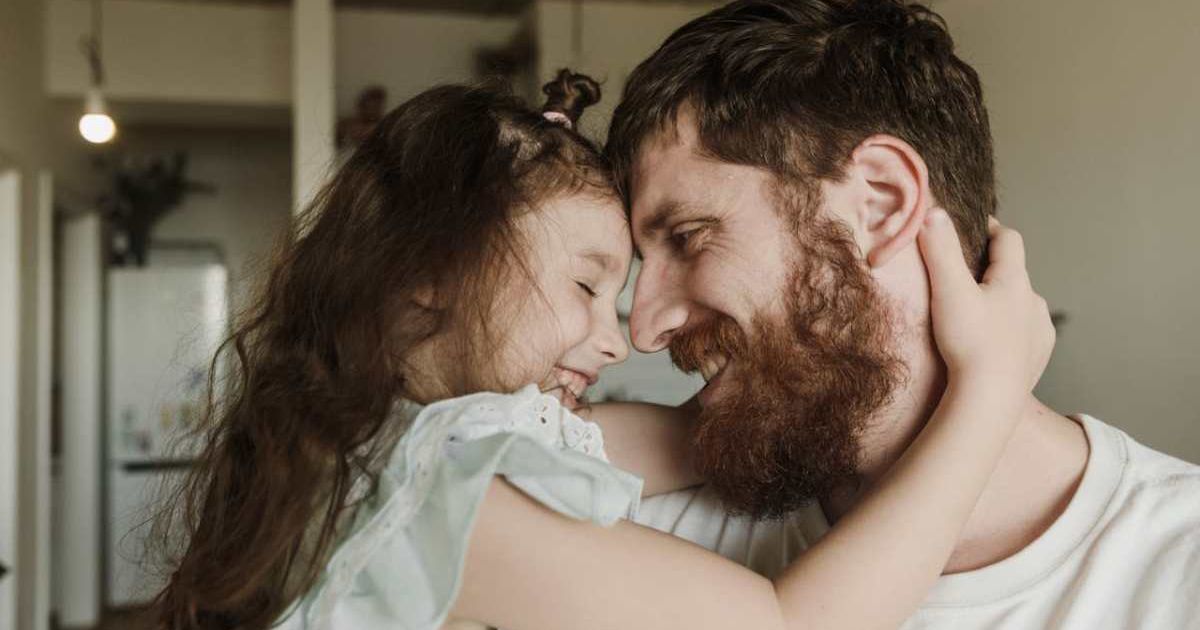 Dad and daughter hugging each other. Representative Cover Image Source: Pexels | Arina Krasnikova