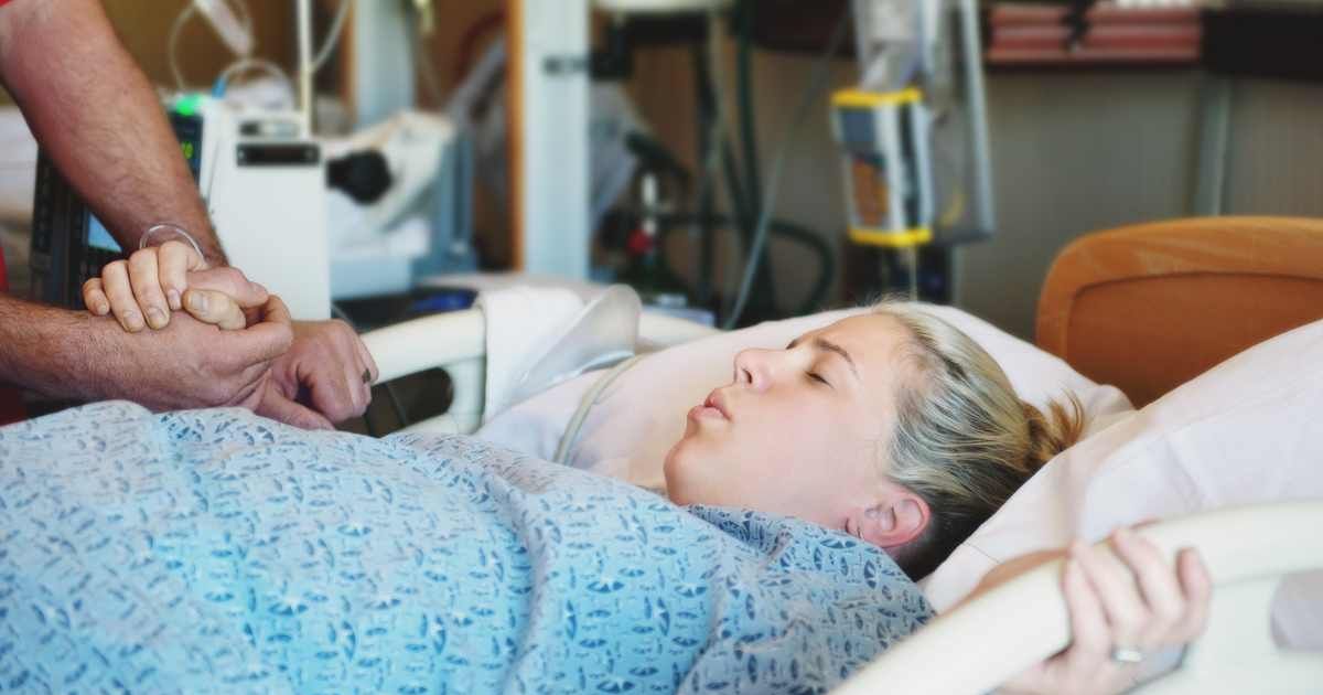 A woman in labor. Representative Cover Image Source: Getty Images | Layland Masuda