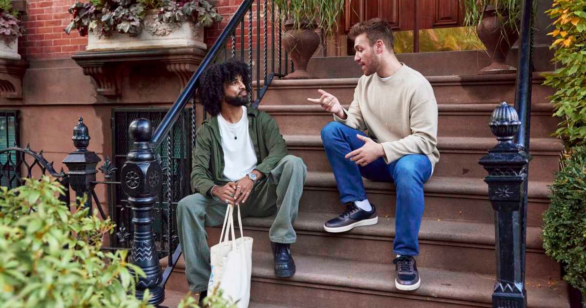 Two men talking to each other. Representative Cover Image Source: Getty Images | The Good Brigade