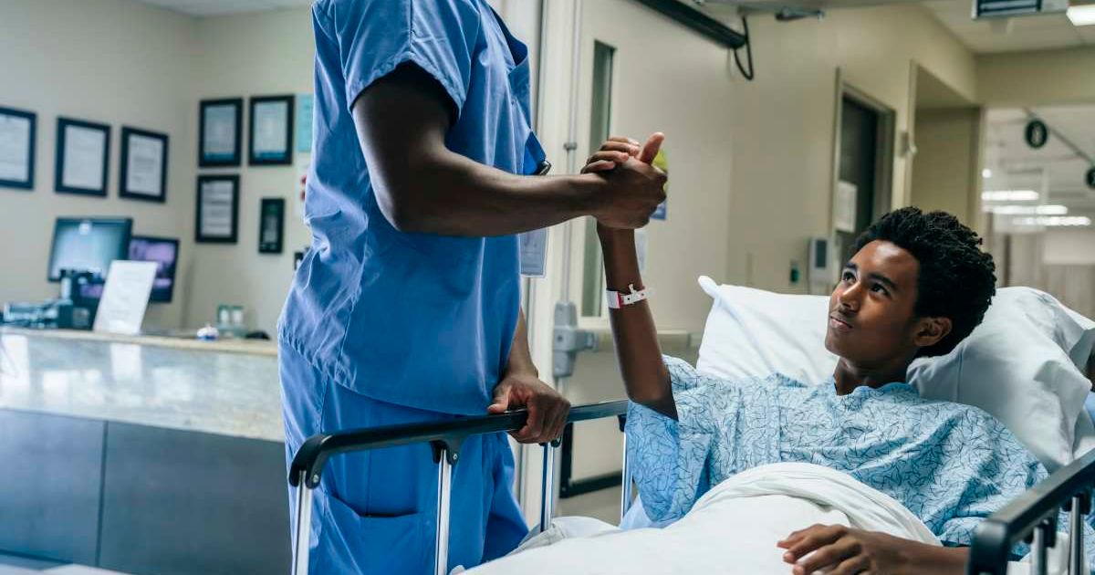 Healthcare professional checking on a teen boy. Representative Cover Image Source: Getty Images | FS Productions