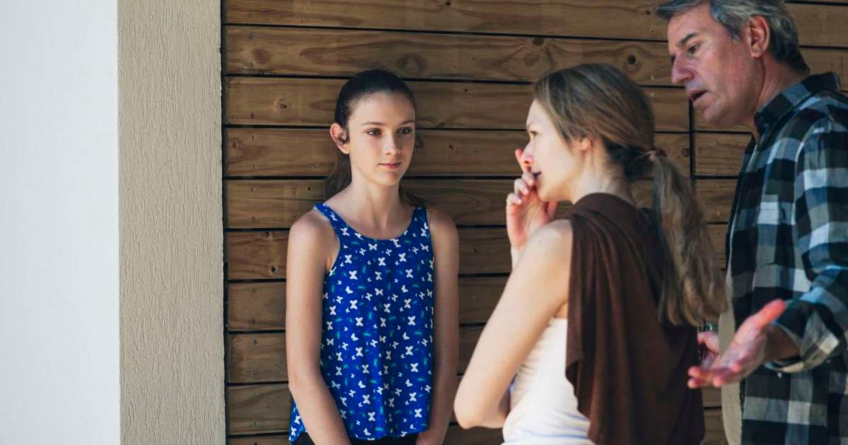 Parents scolding a teen girl. Representative Cover Image Source: Getty Images | Frederic Cirou