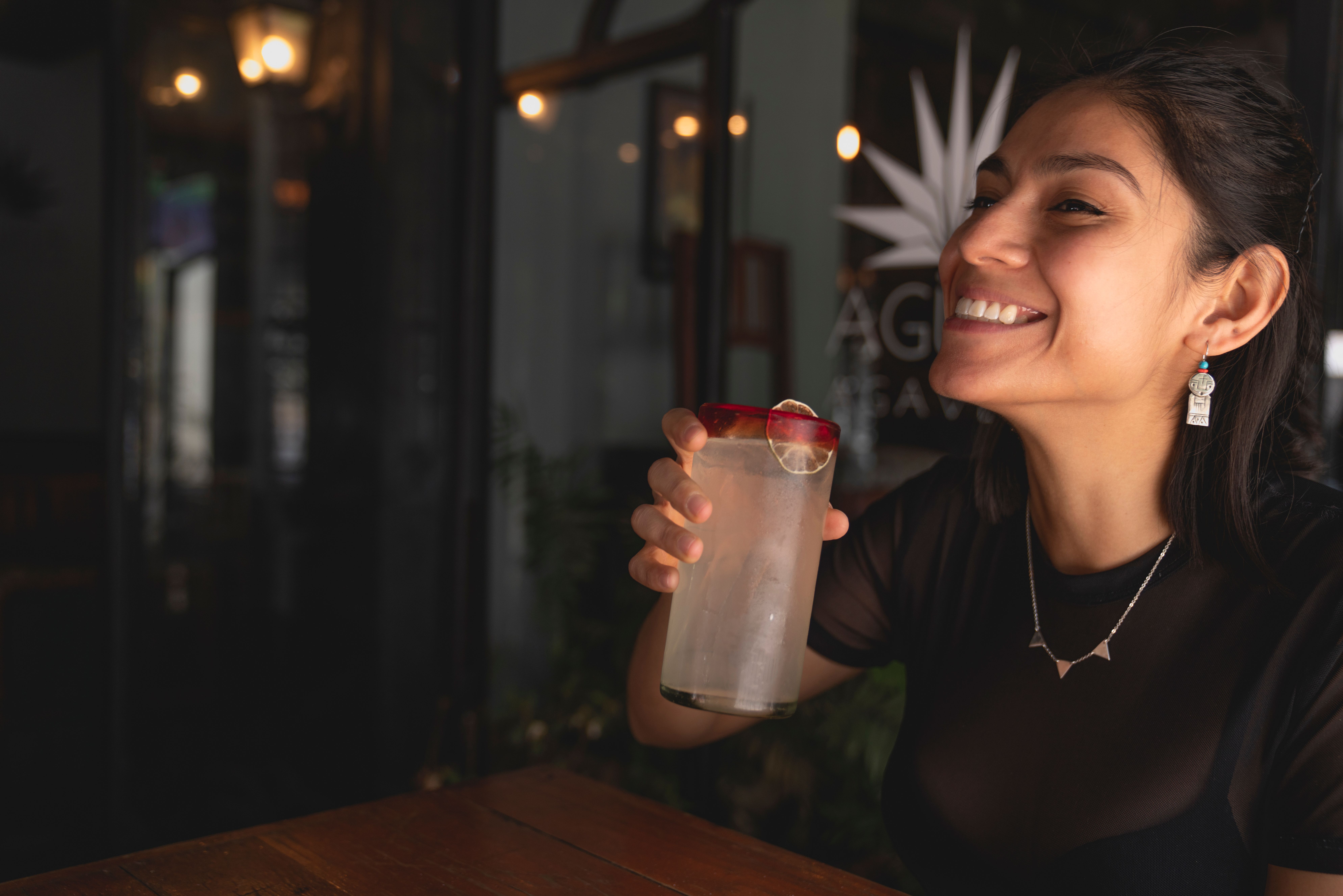 A woman laughs sarcastically.