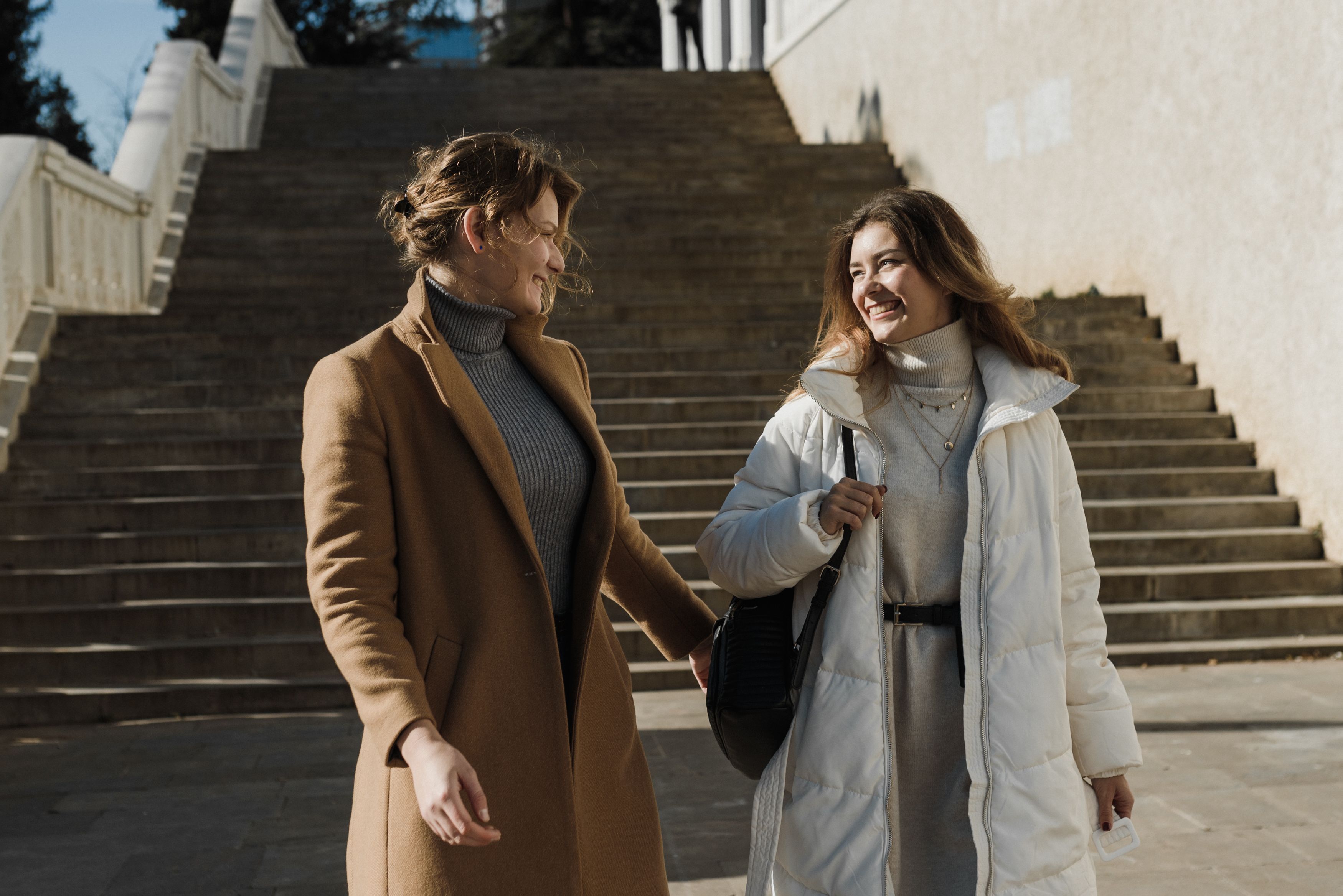 Two women are walking together.