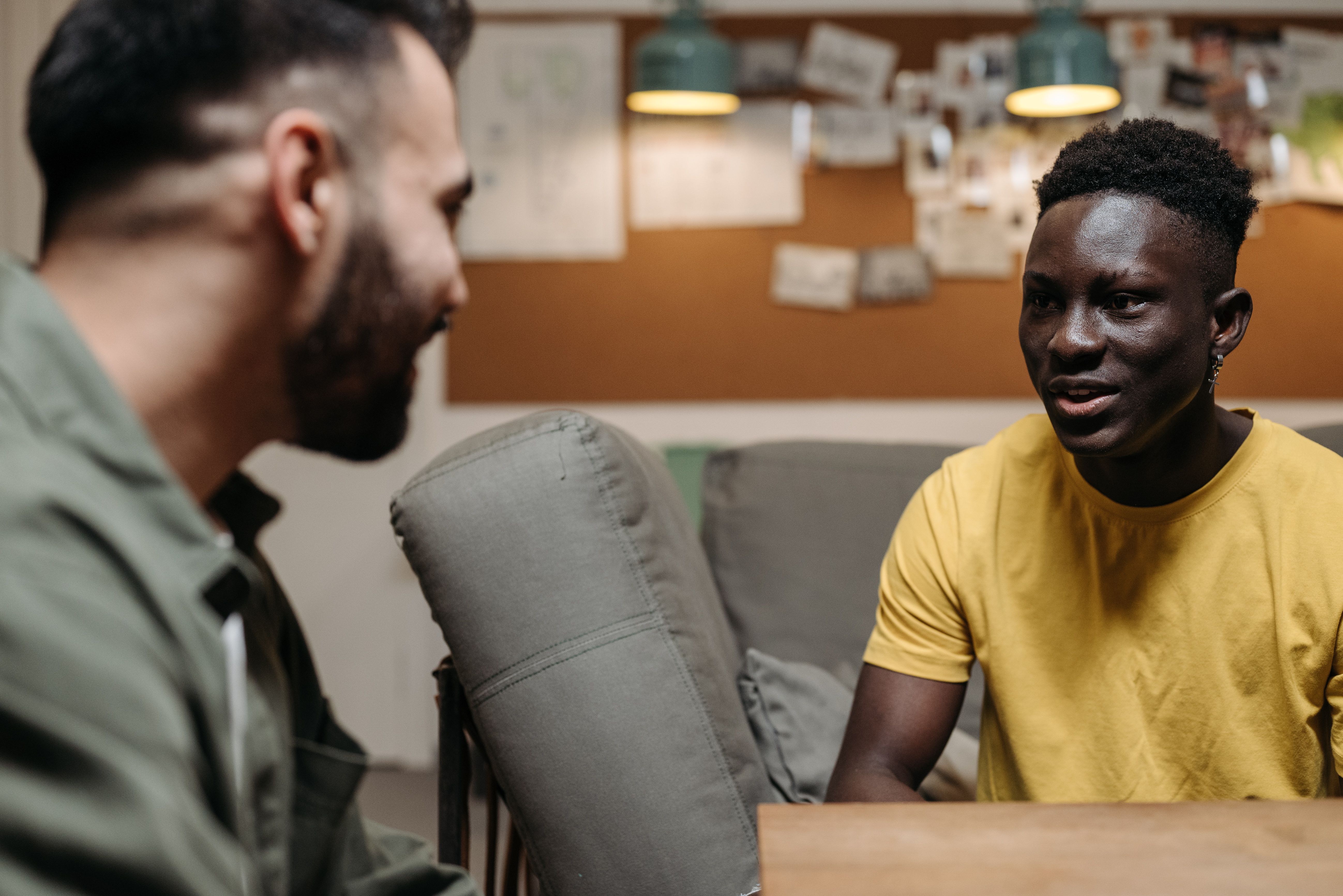 Two men are having a conversation.