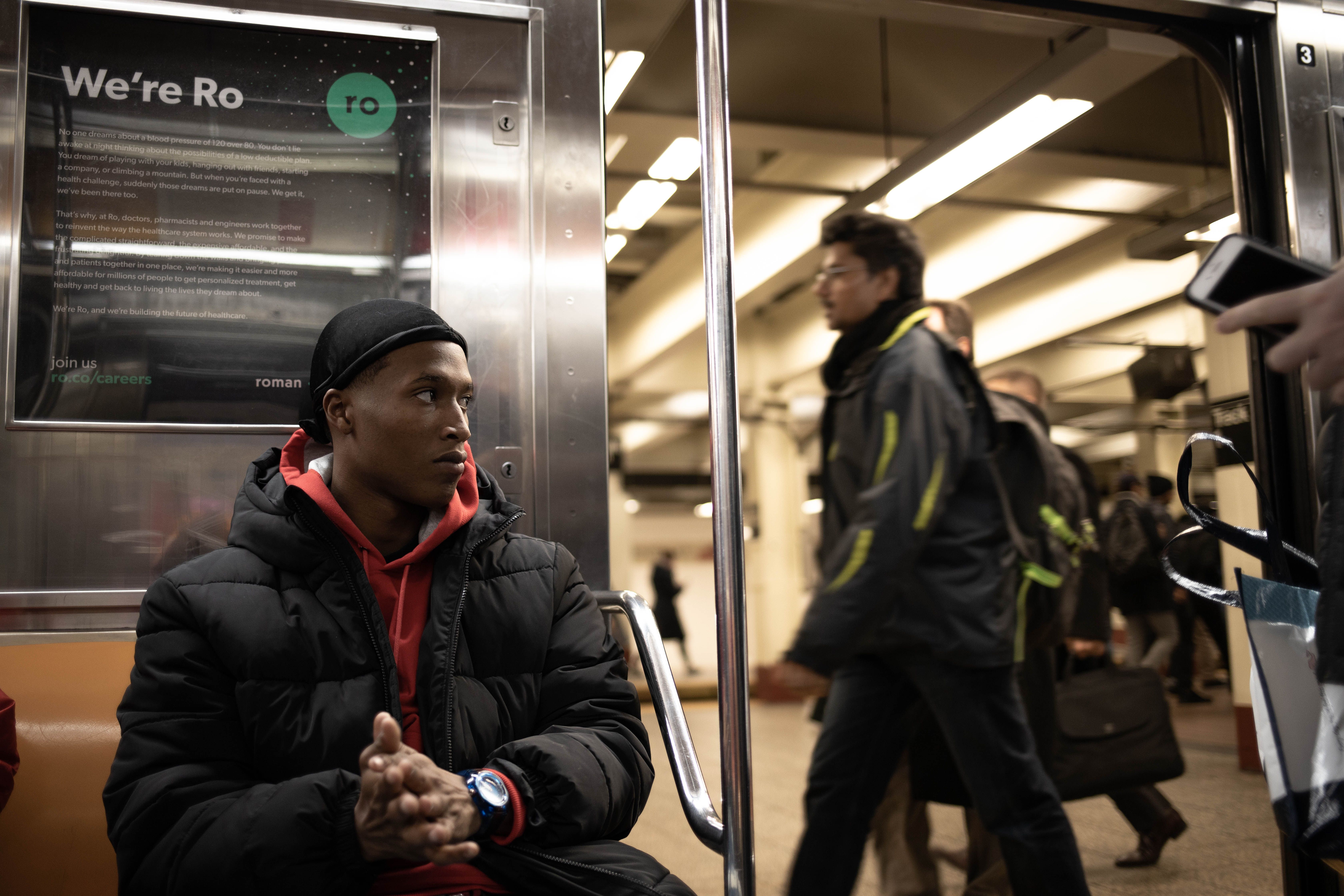 A man is sitting in the train.