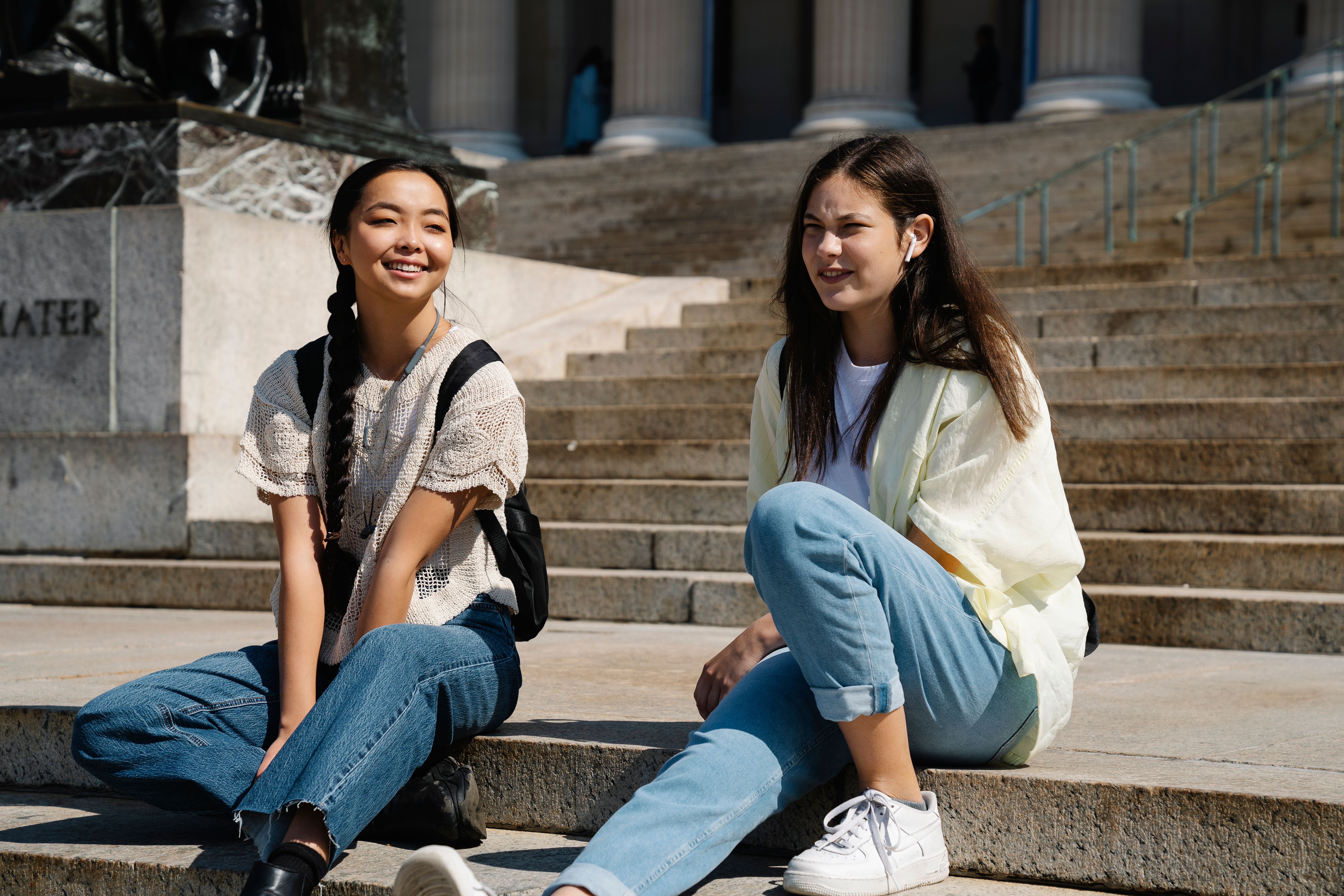 Two teenage girls are talking.