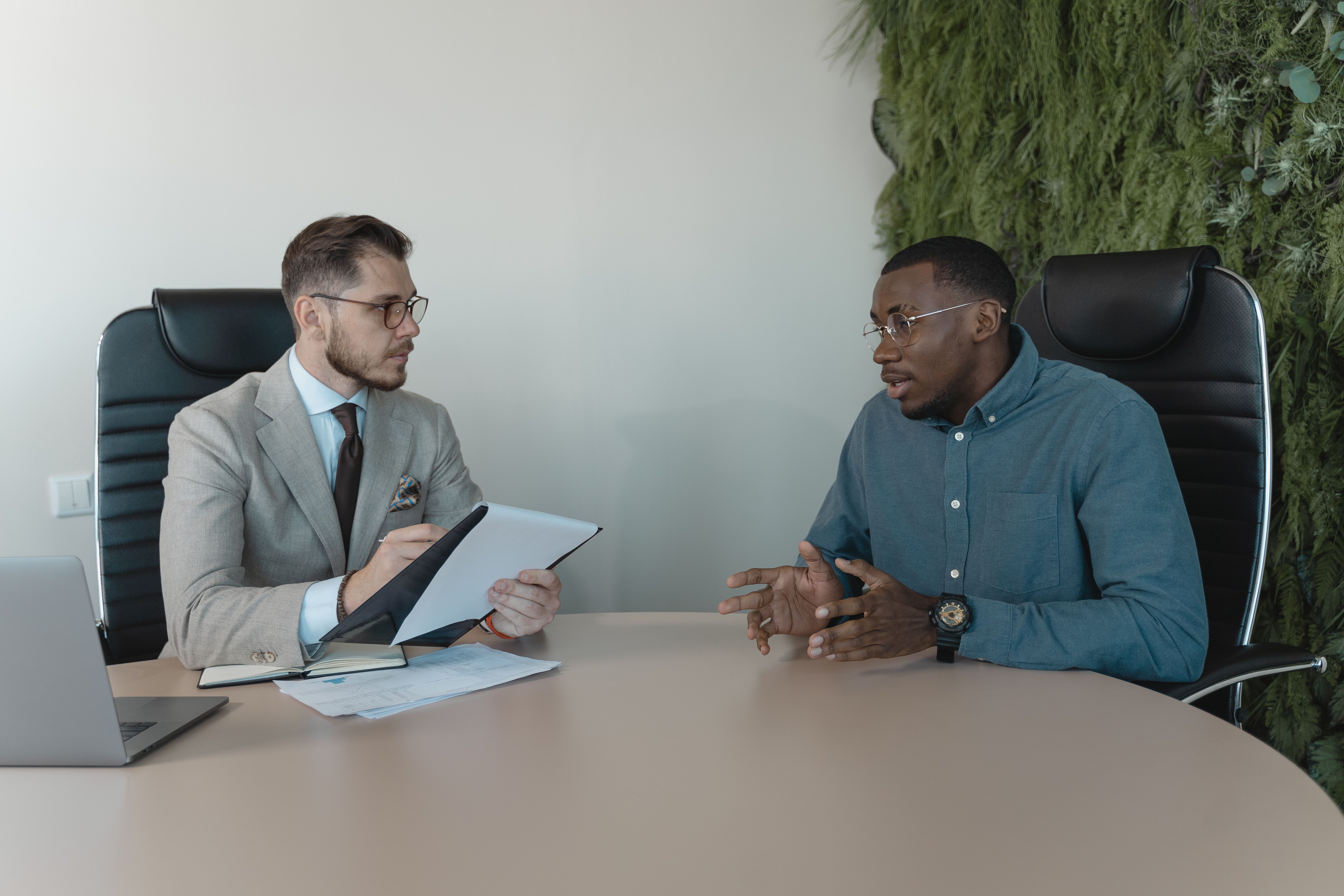 A man is giving an interview.