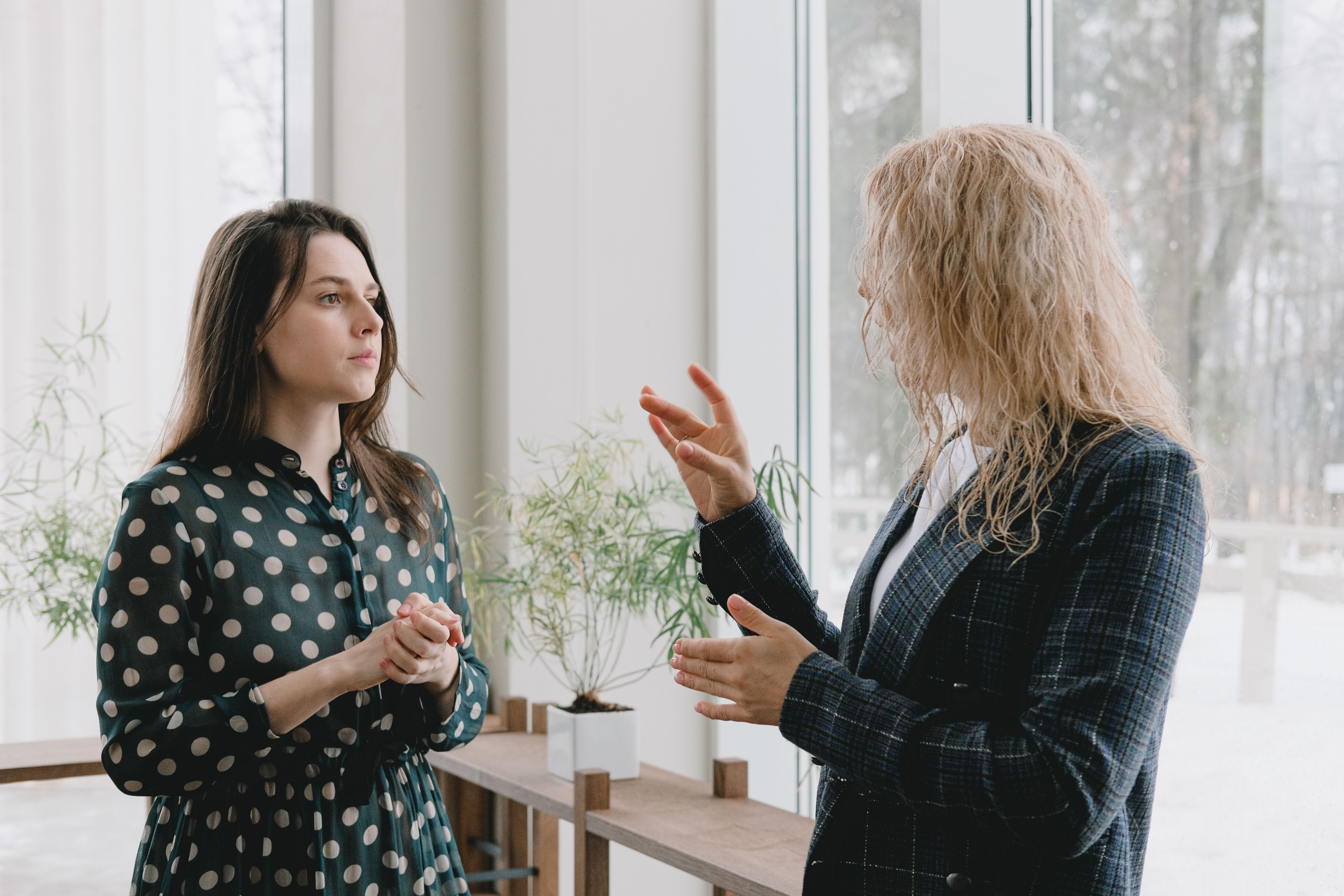 Two women are having a heated discussion.