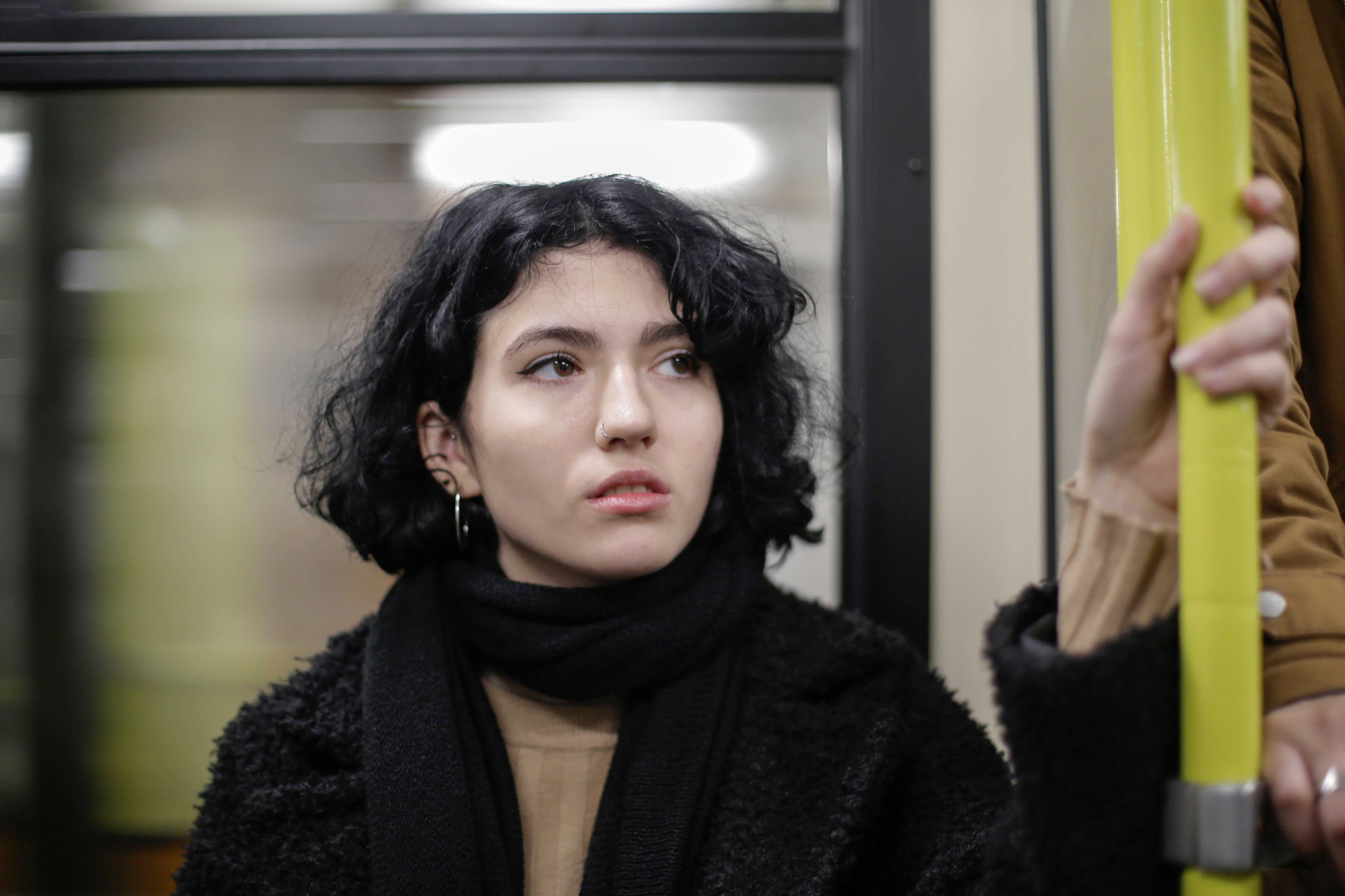 A woman looks scared and worried.