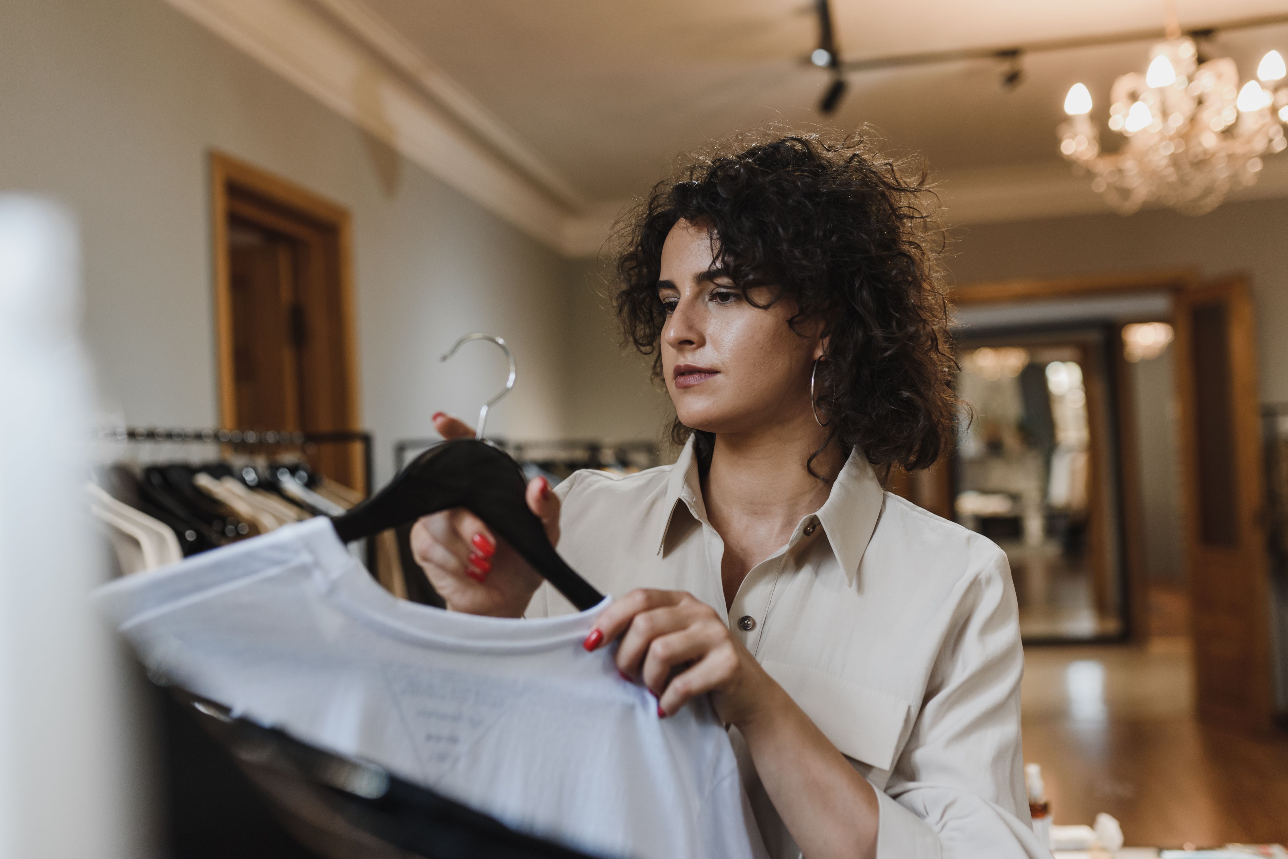 A woman is engrossed in shopping.