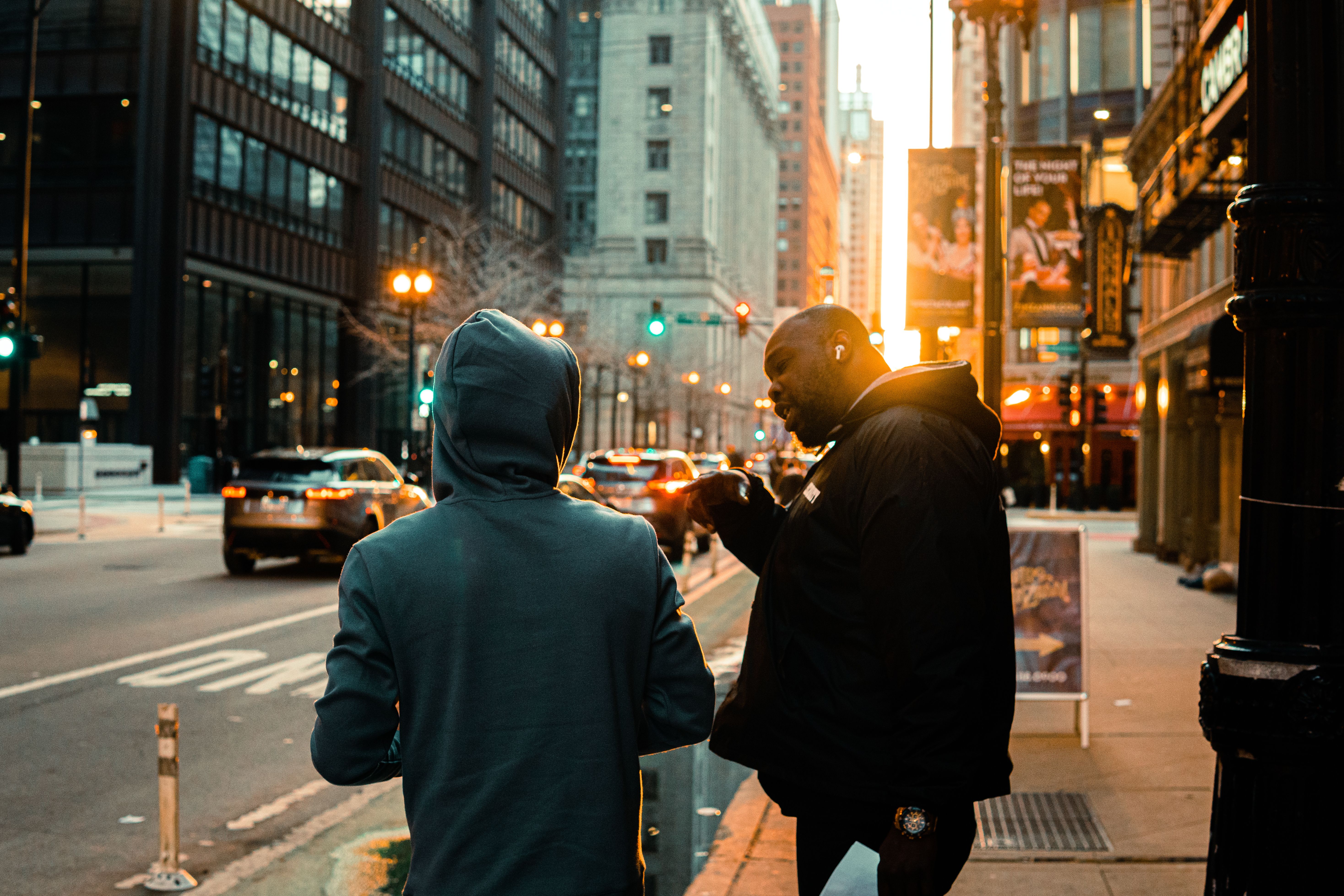 Two men having a heated argument on the street.