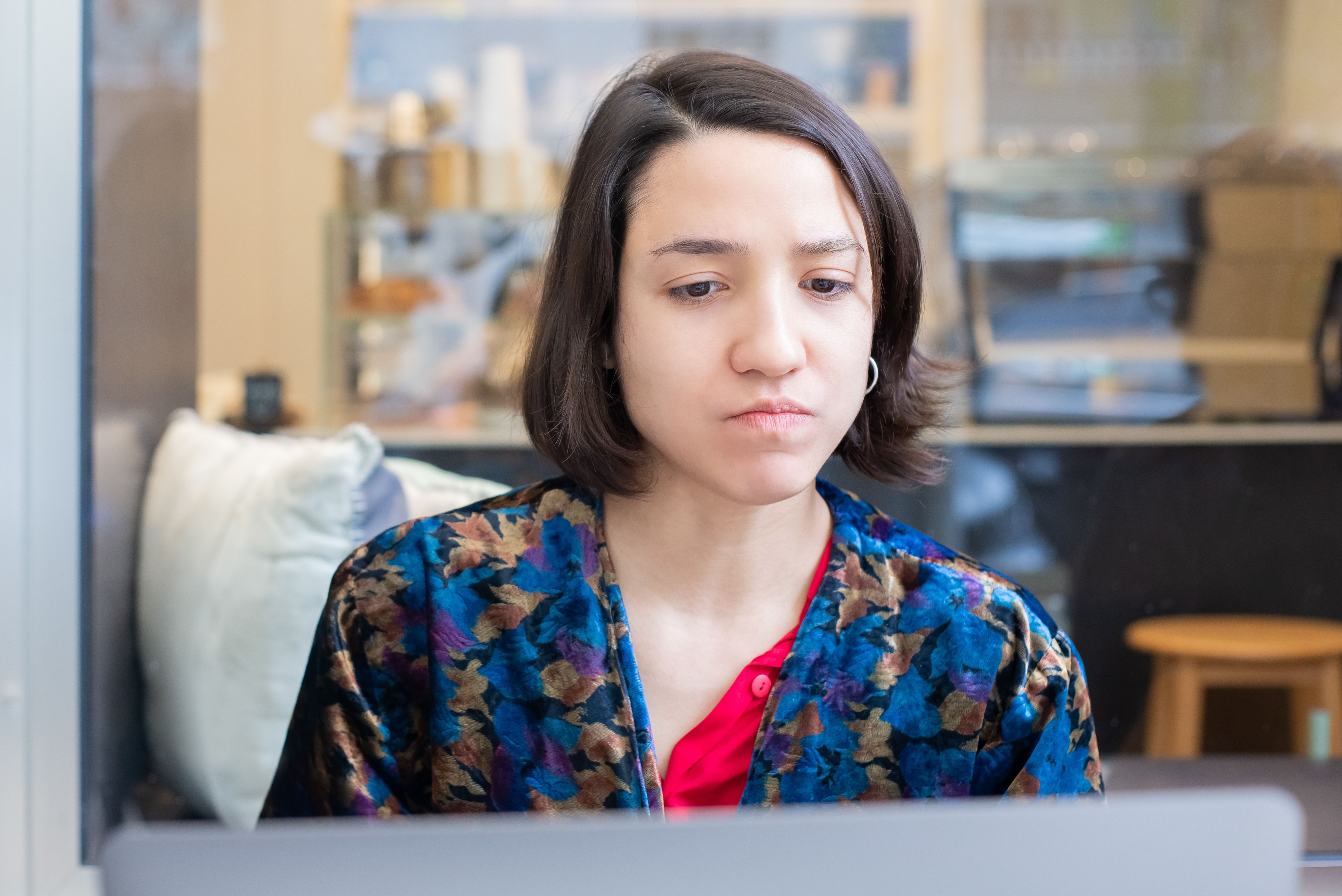 A woman looks annoyed.