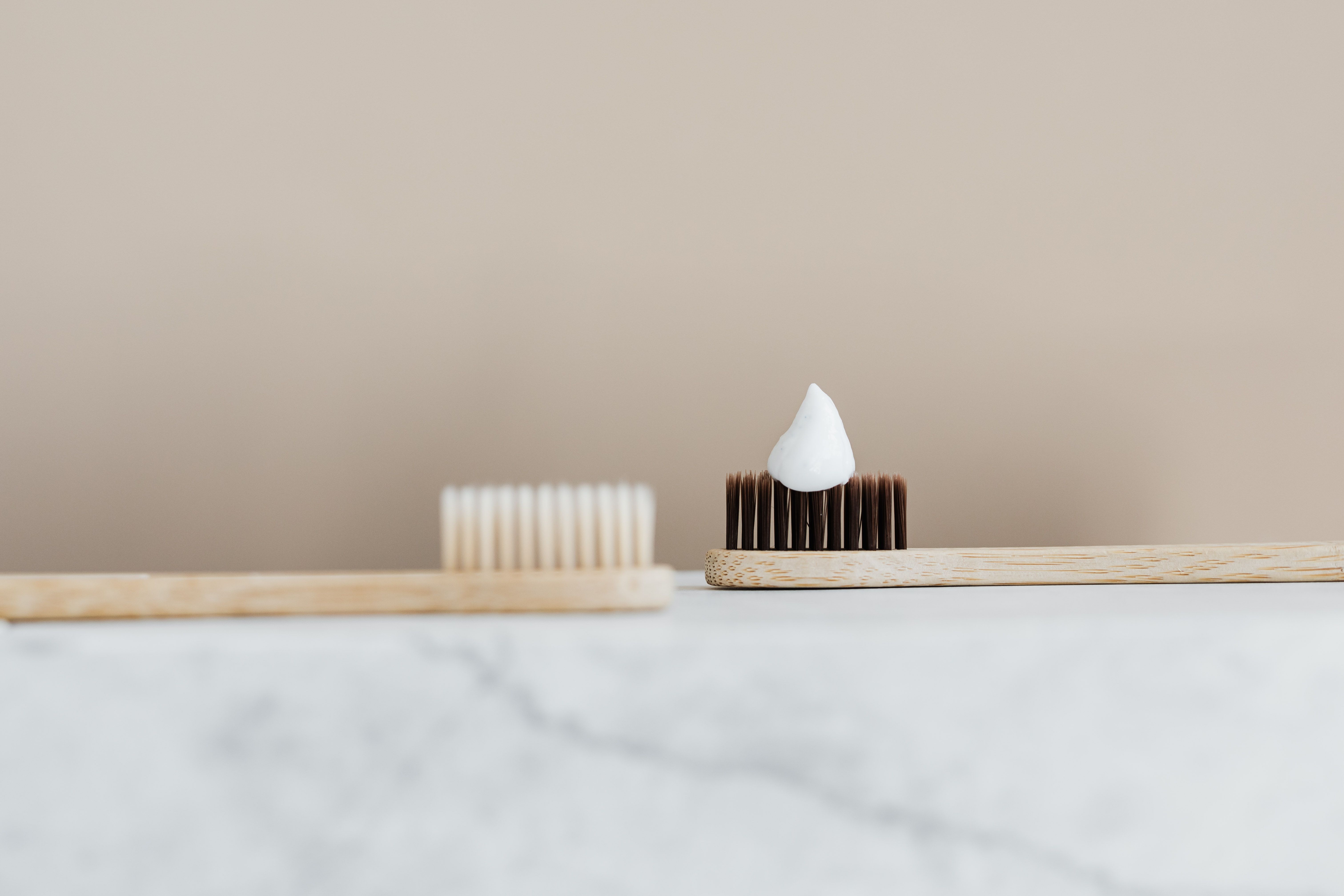 Multiple toothbrushes in a person's home.