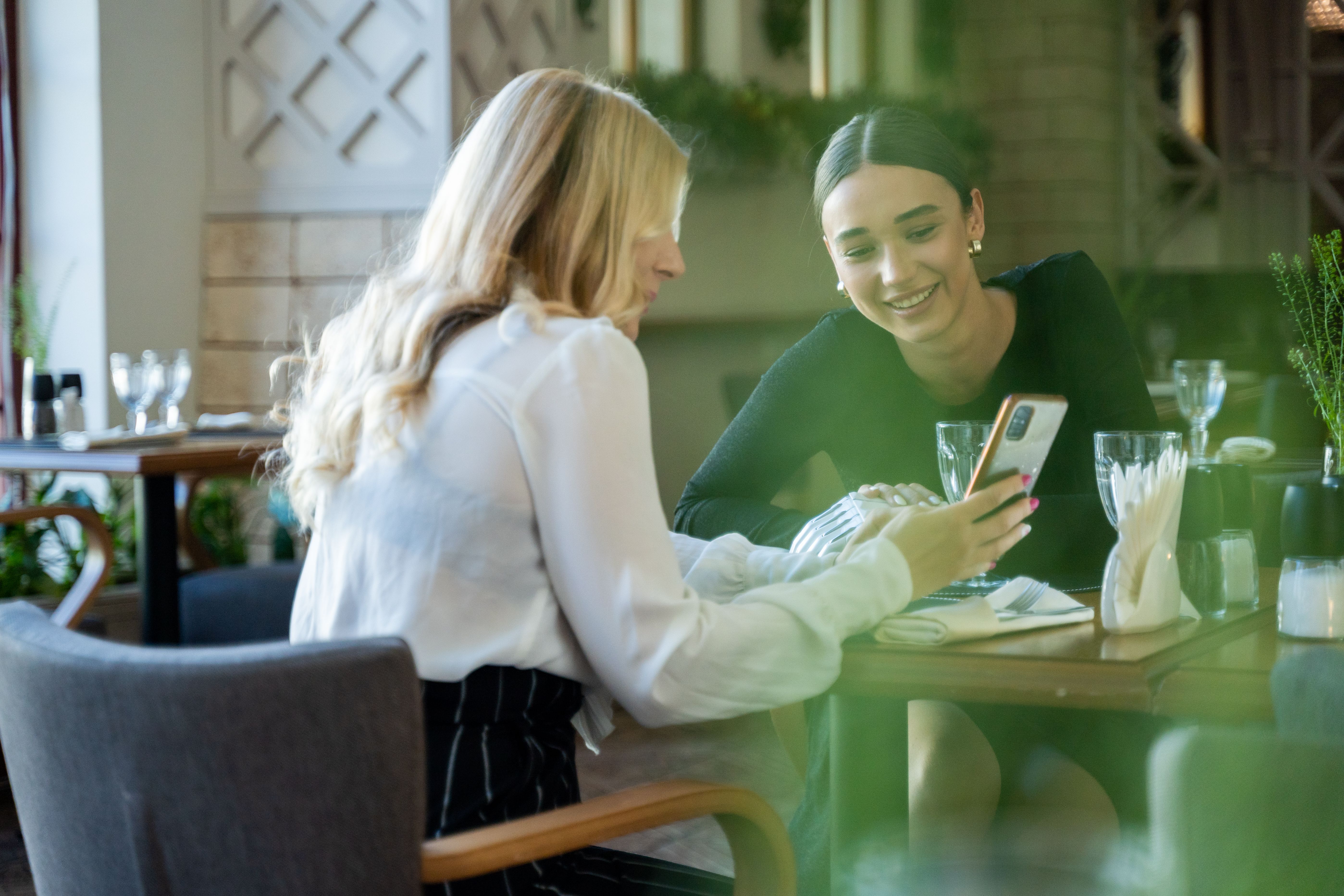 Two women are having a conversation.