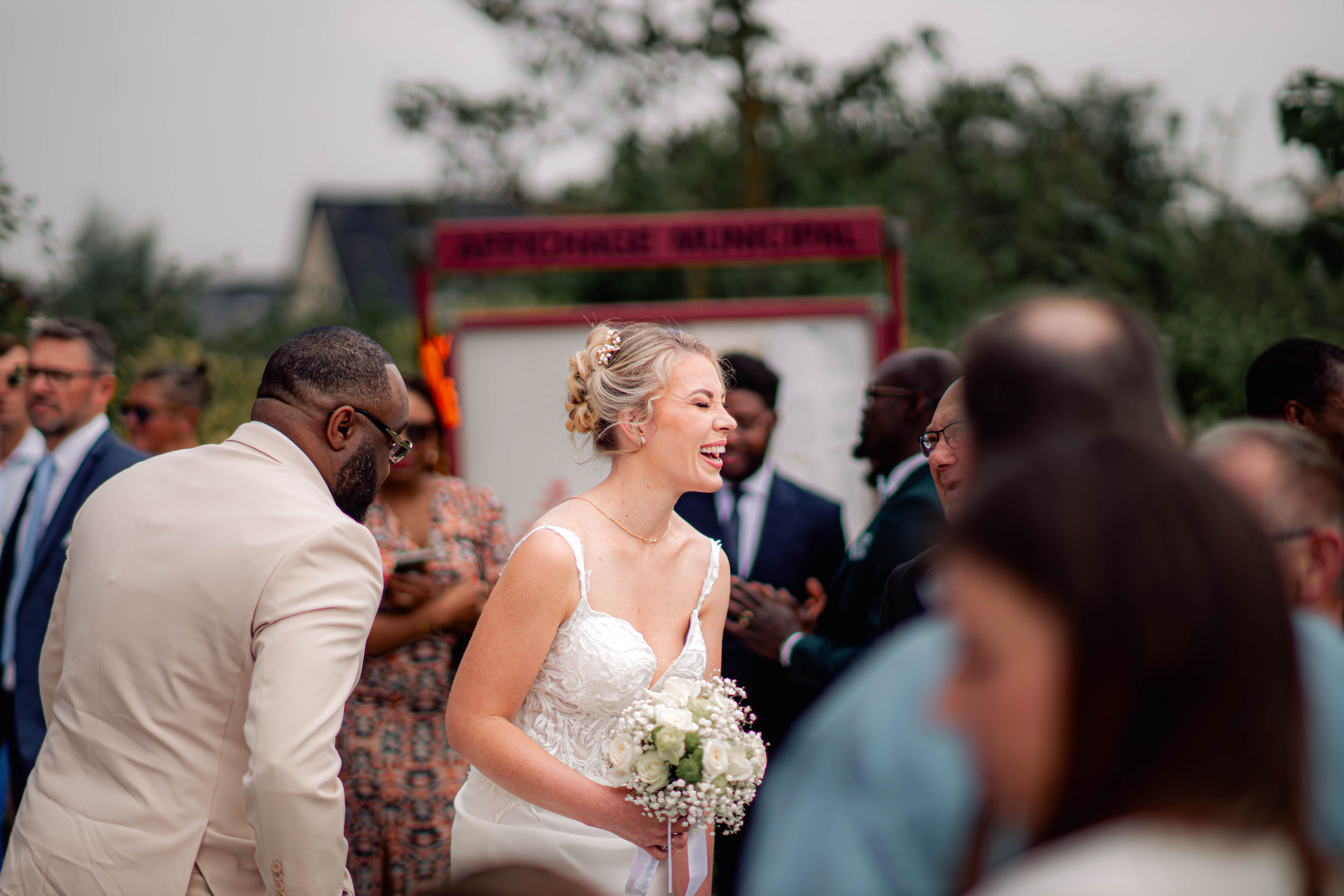 A bride is talking to her guests.