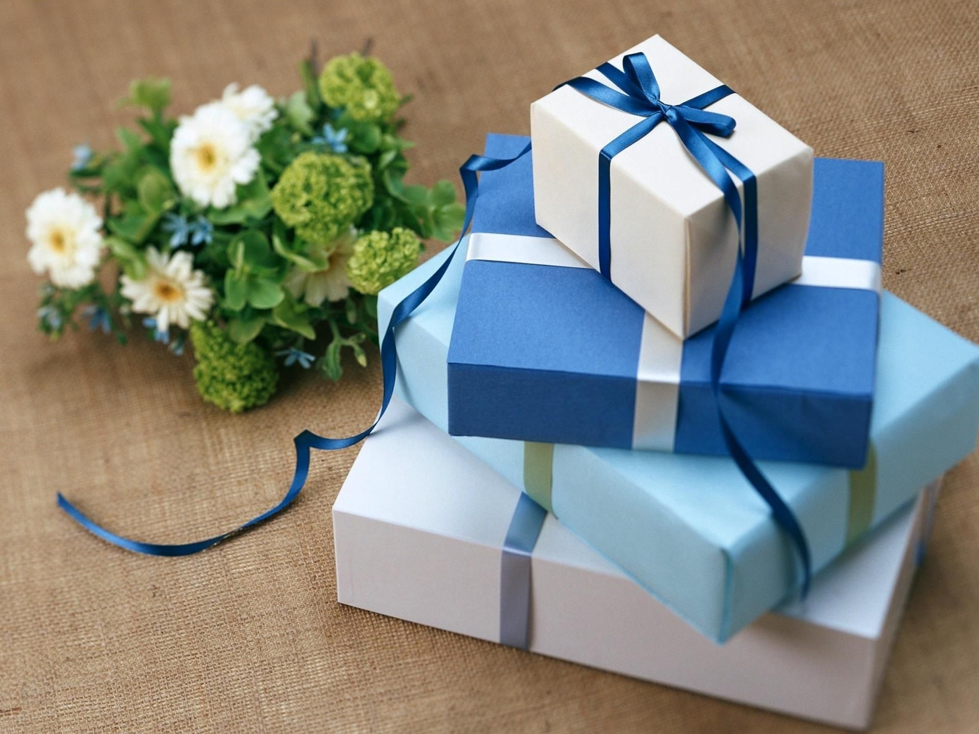 A stack of gifts neatly wrapped.