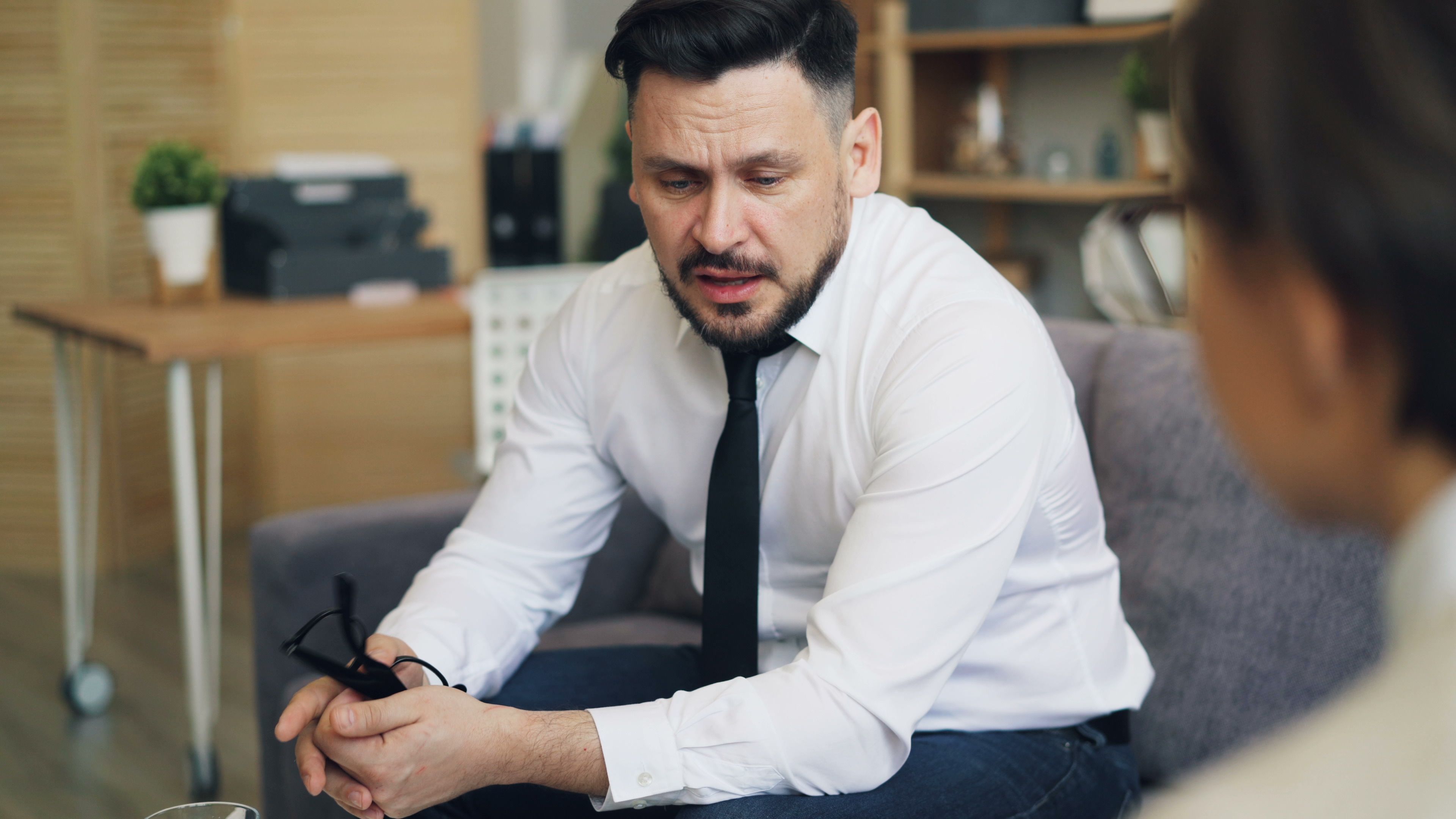 An employee looks emotional.