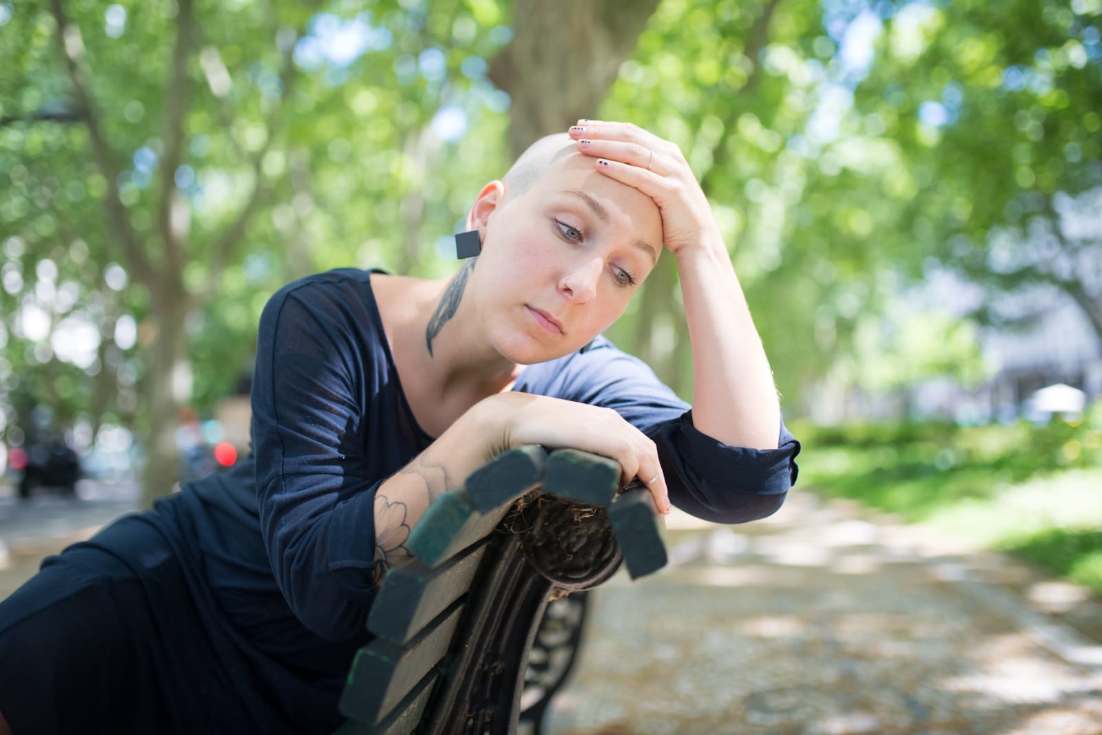 Bald woman in deep thought (Representative Image Source: Pexels | Kampus Production)
