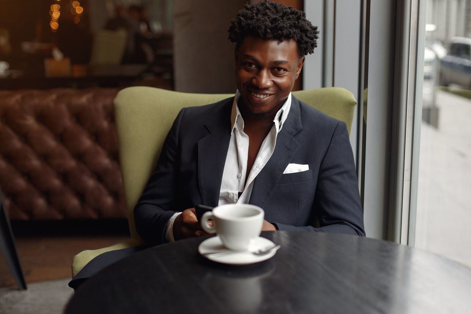 A man waiting at a restaurant.