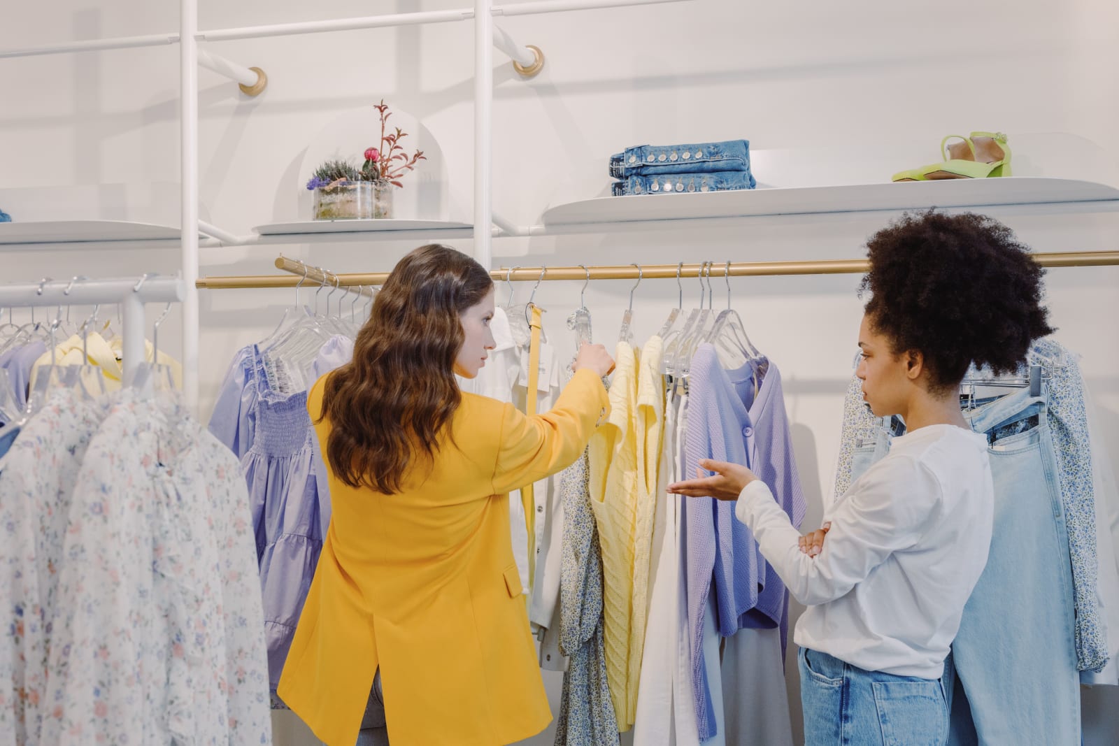 Two women having a tense disagreement inside a stylish boutique. (Representative Image Source: Pexels | Ron Lach)