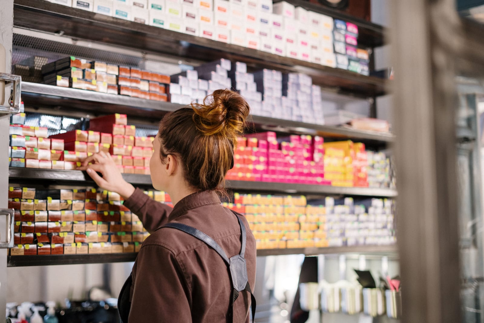 A woman is shopping at a cosmetic store.