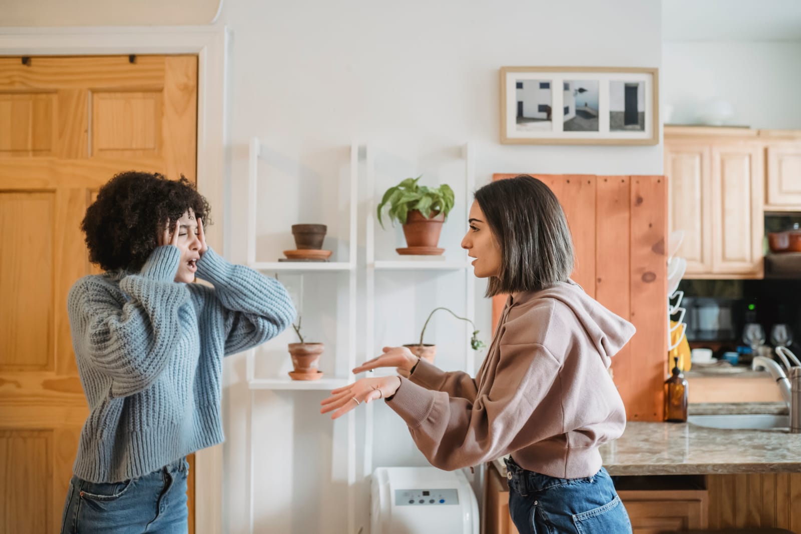 Two women engaged in a heated argument. (Representative Image Source: Pexels | Liza Summer)