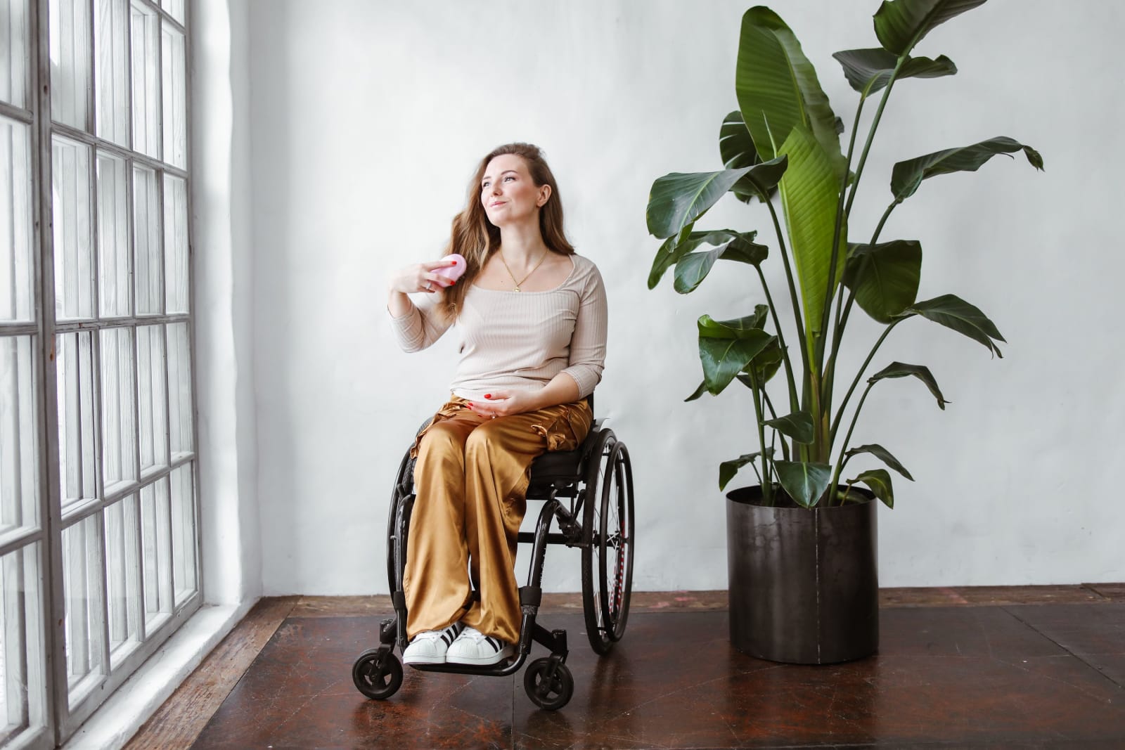 A woman in a wheelchair.