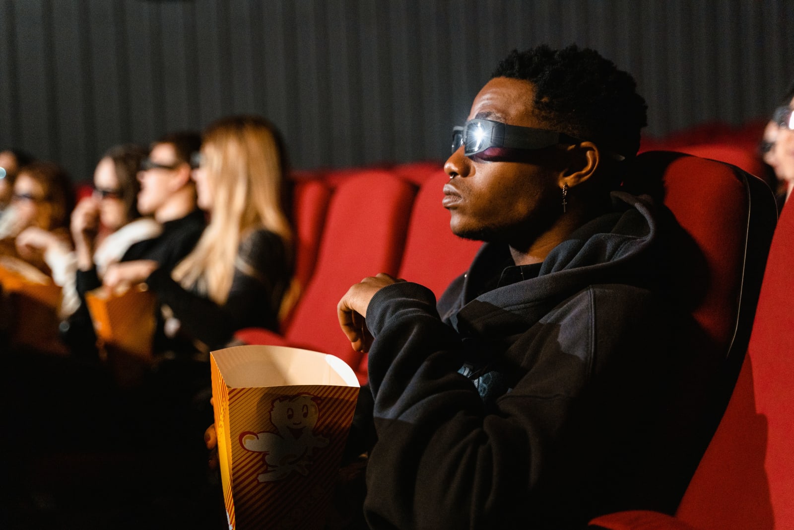 People watching a movie in a theater.