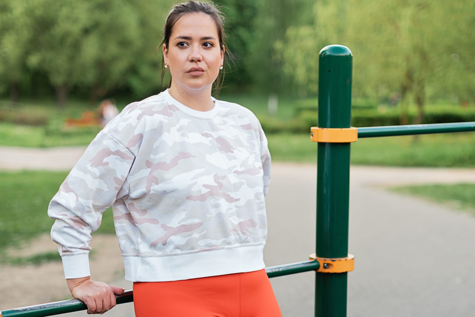 A woman looks upset as she ponders deeply.