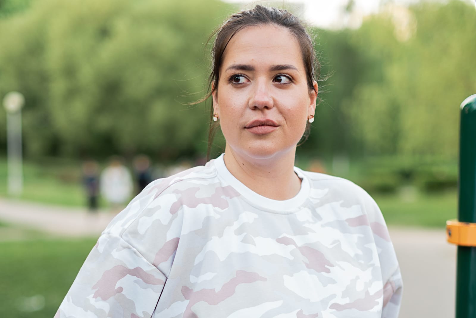 A plus-sized woman looks upset.
