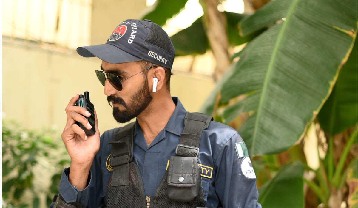 Security guard using walkie talkie. (Representative Image Source: Pexels |  Malik Usman)