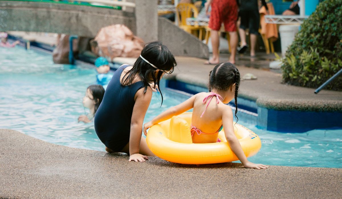 Two girls by the swimming pool. (Representative Image Source: Pexels | Kenneth Surillo)