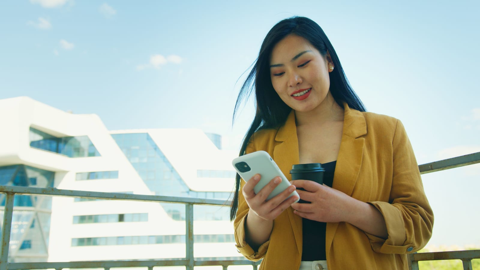 Woman happily texting (Representative Image Source: Pexels | Artem Podrez)