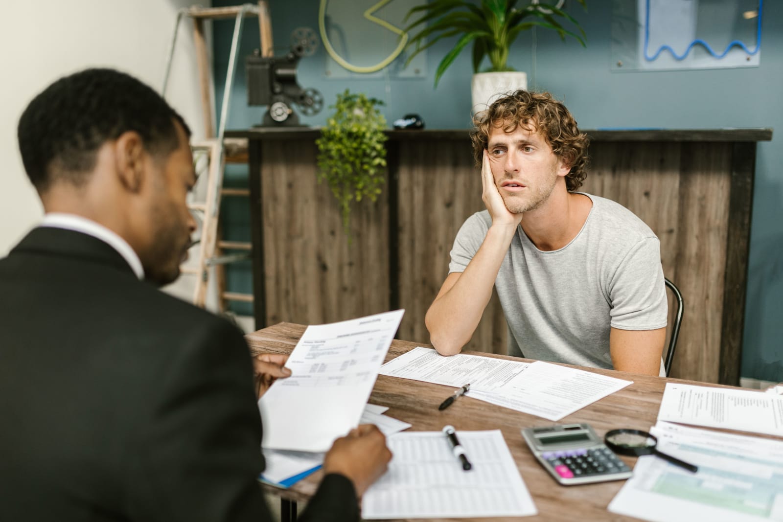 A customer sharing complaints with manager.