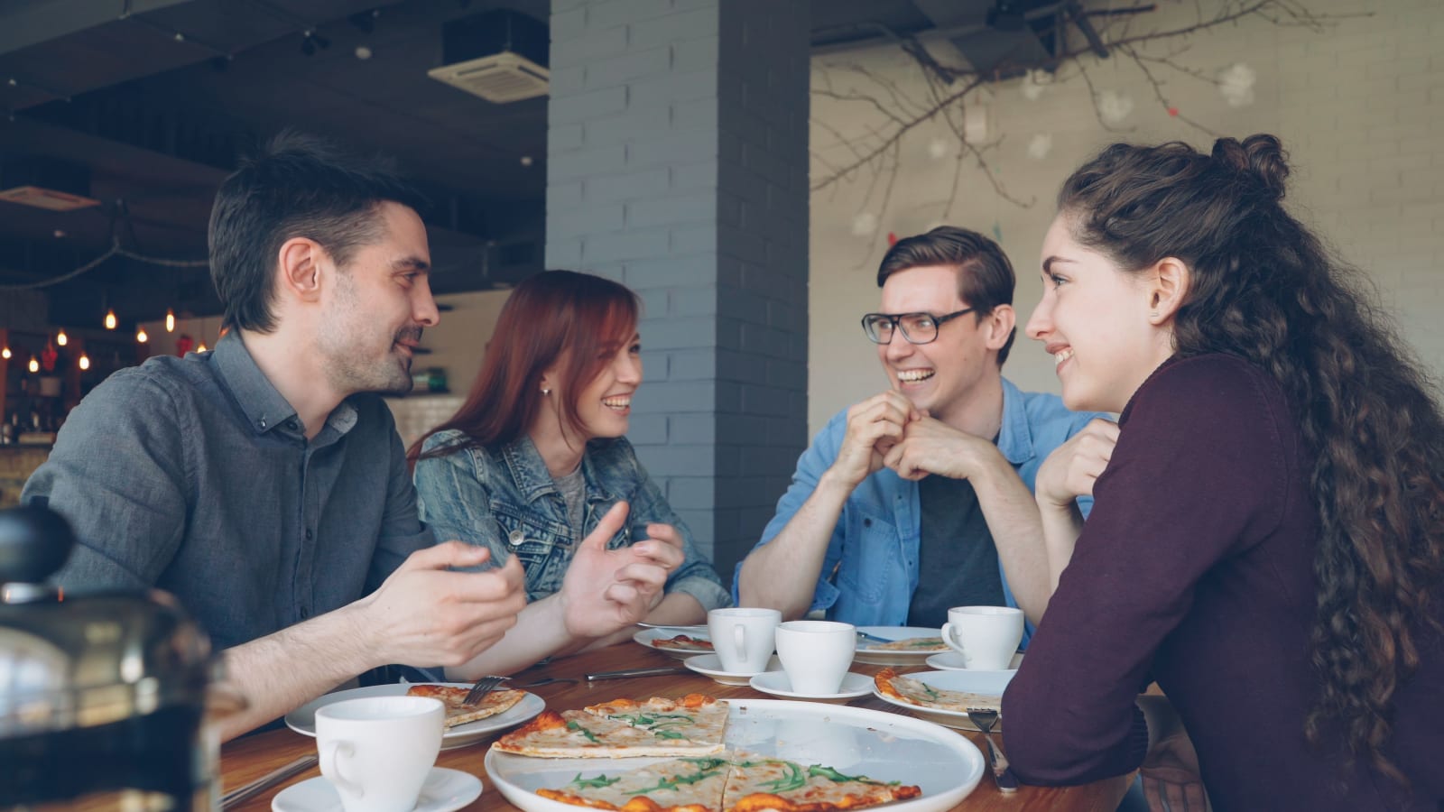 A group of friends at a restaurant.