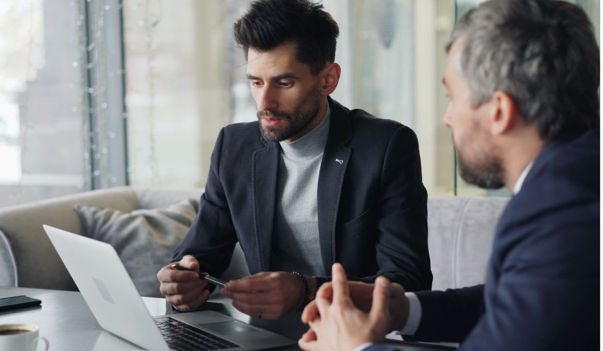 Two employees engaged in a meeting. (Representative Image Source: Pexels | Vitaly Gariev)