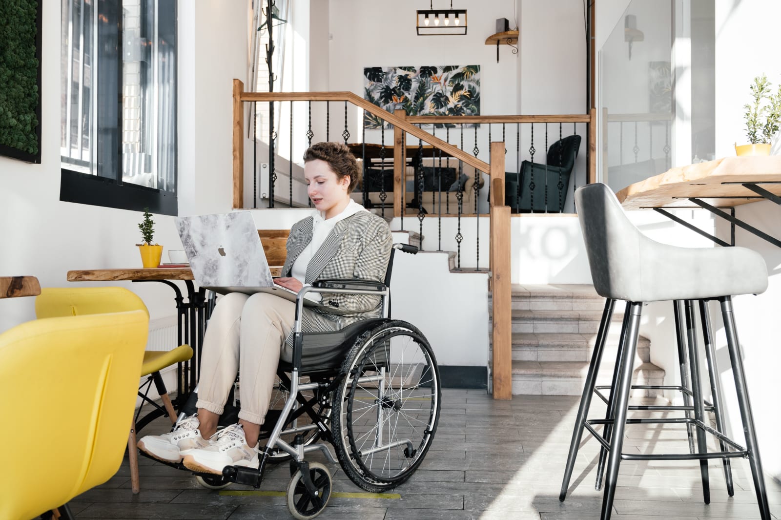 A young woman in a wheelchair.