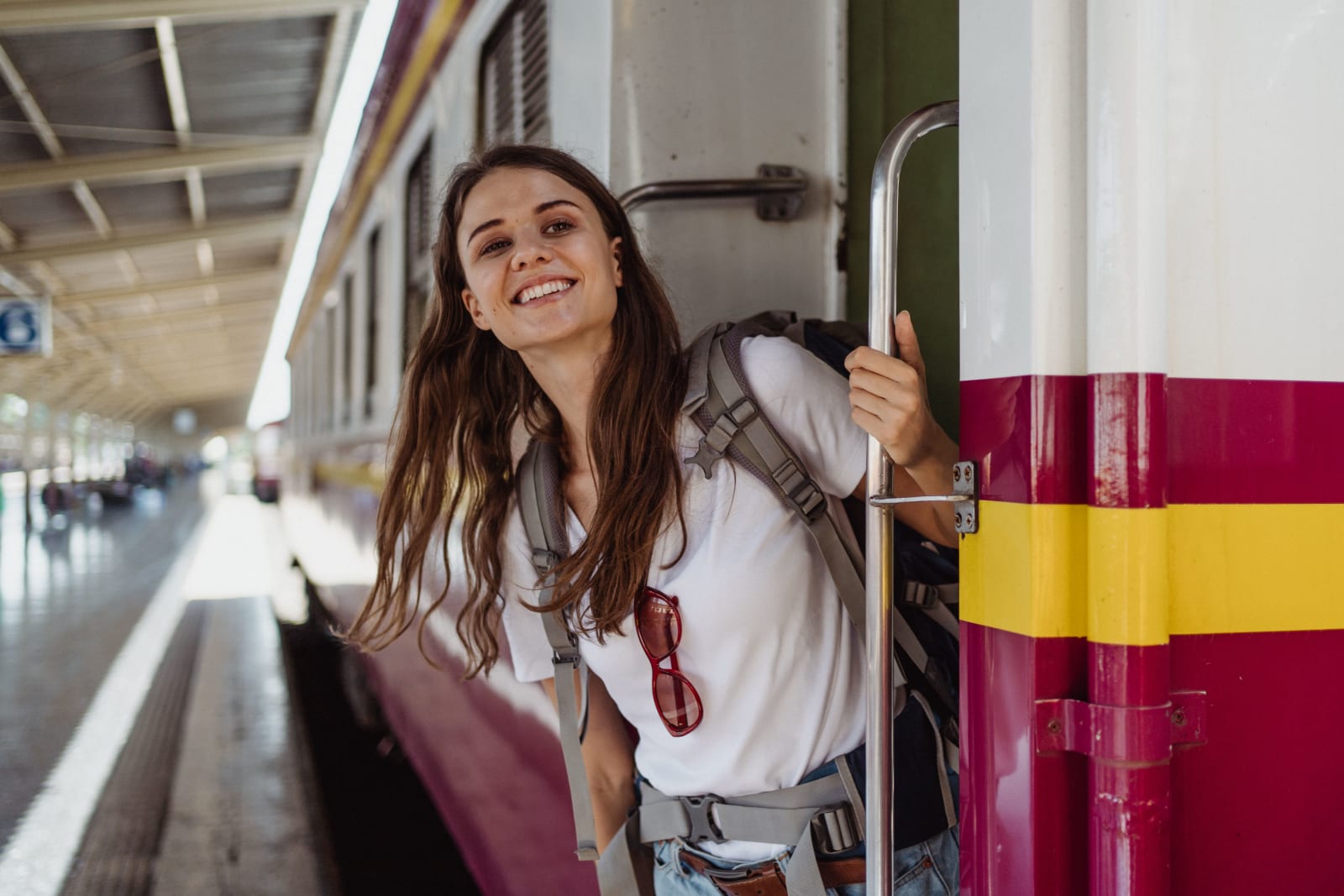 A woman is in a train