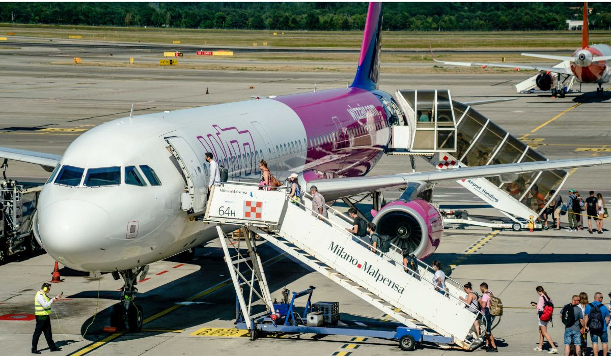 Travelers board an airplane. (Representative Image Source: Pexels | Atlantic Ambience)