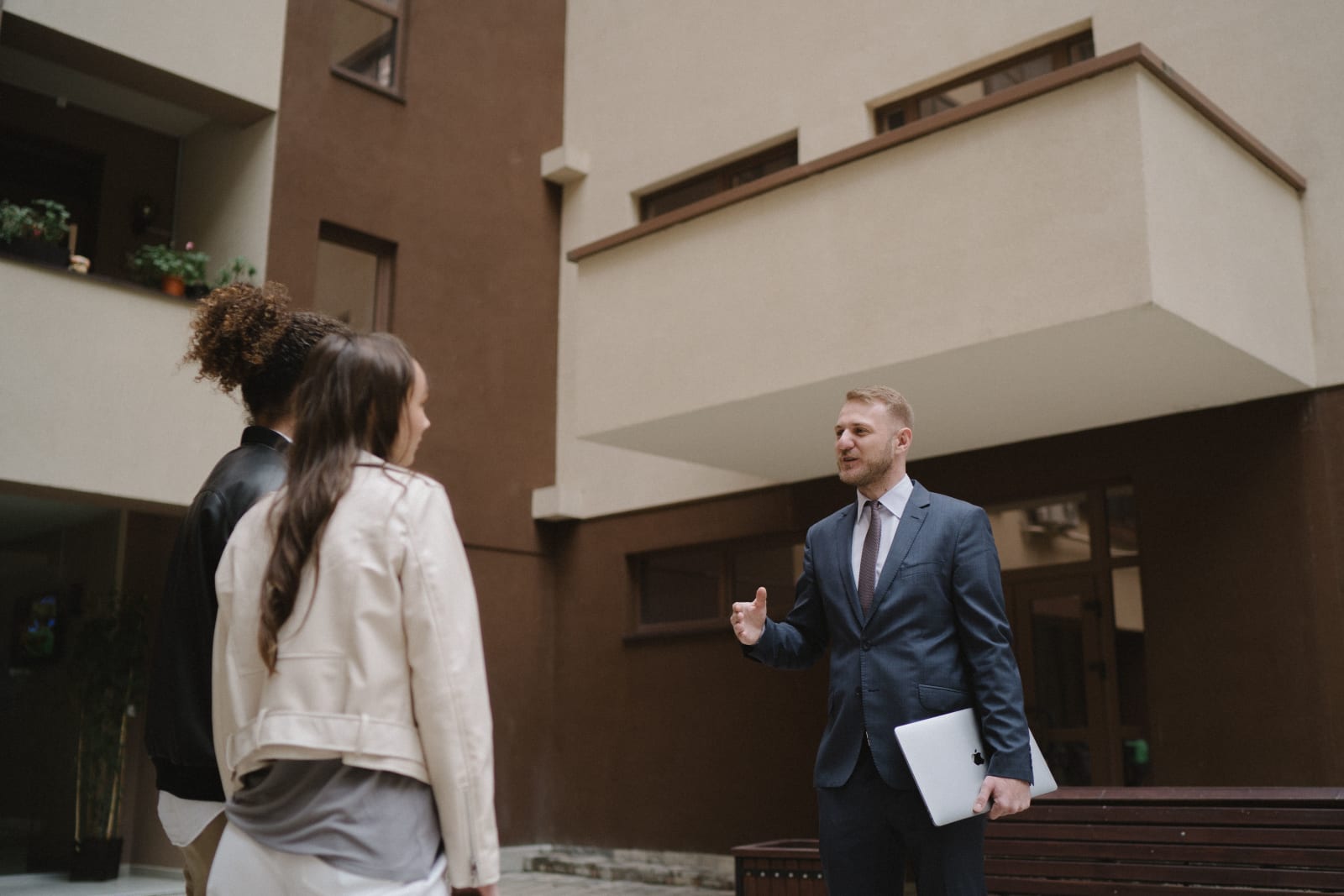 A man is inspecting house and speaking with residents.  (Representative Image Source: Pexels| Anastasia Shuraeva)