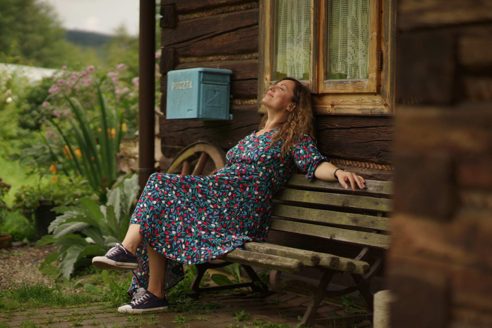 Woman sitting outside (Representative Image Source: Pexels | Niko Prodan)
